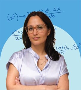An adult with glasses on, with some mathematics equation at the back.