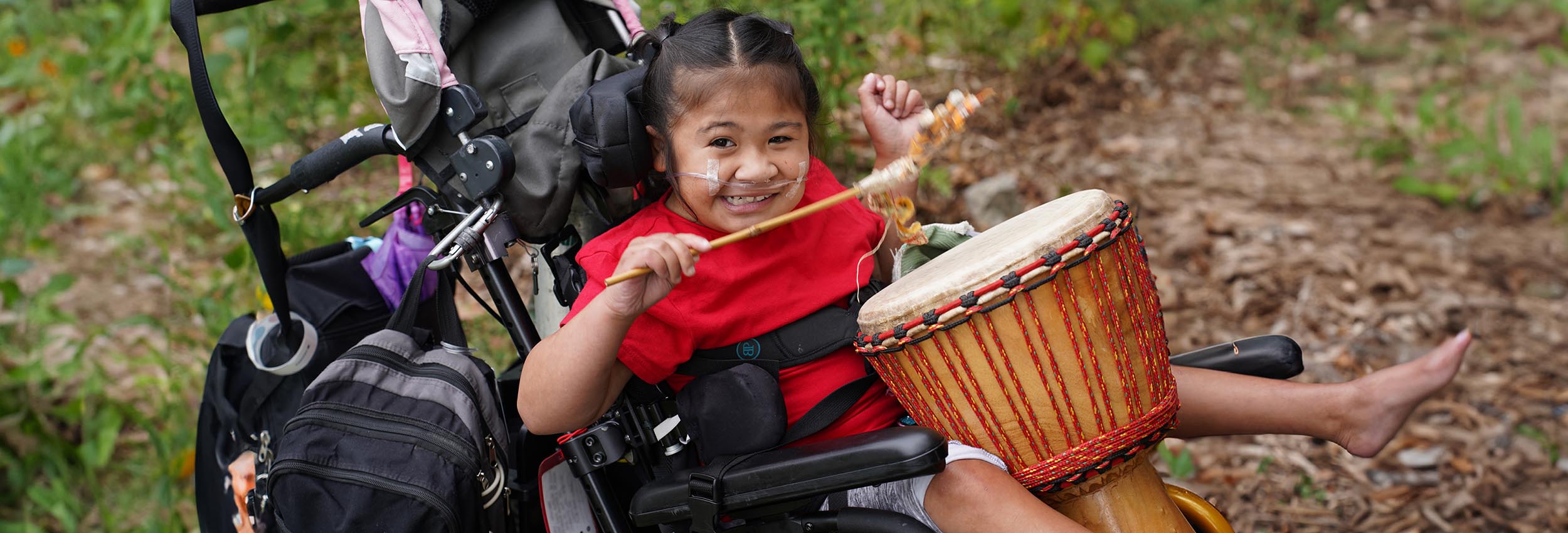 A child playing a drum